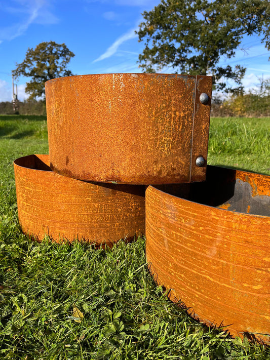 Corten steel D plant pots reclaimed rivets